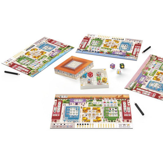 A colorful board game set arranged on a white background, including multiple illustrated game boards, a small orange box, several dice, and two black pens.
